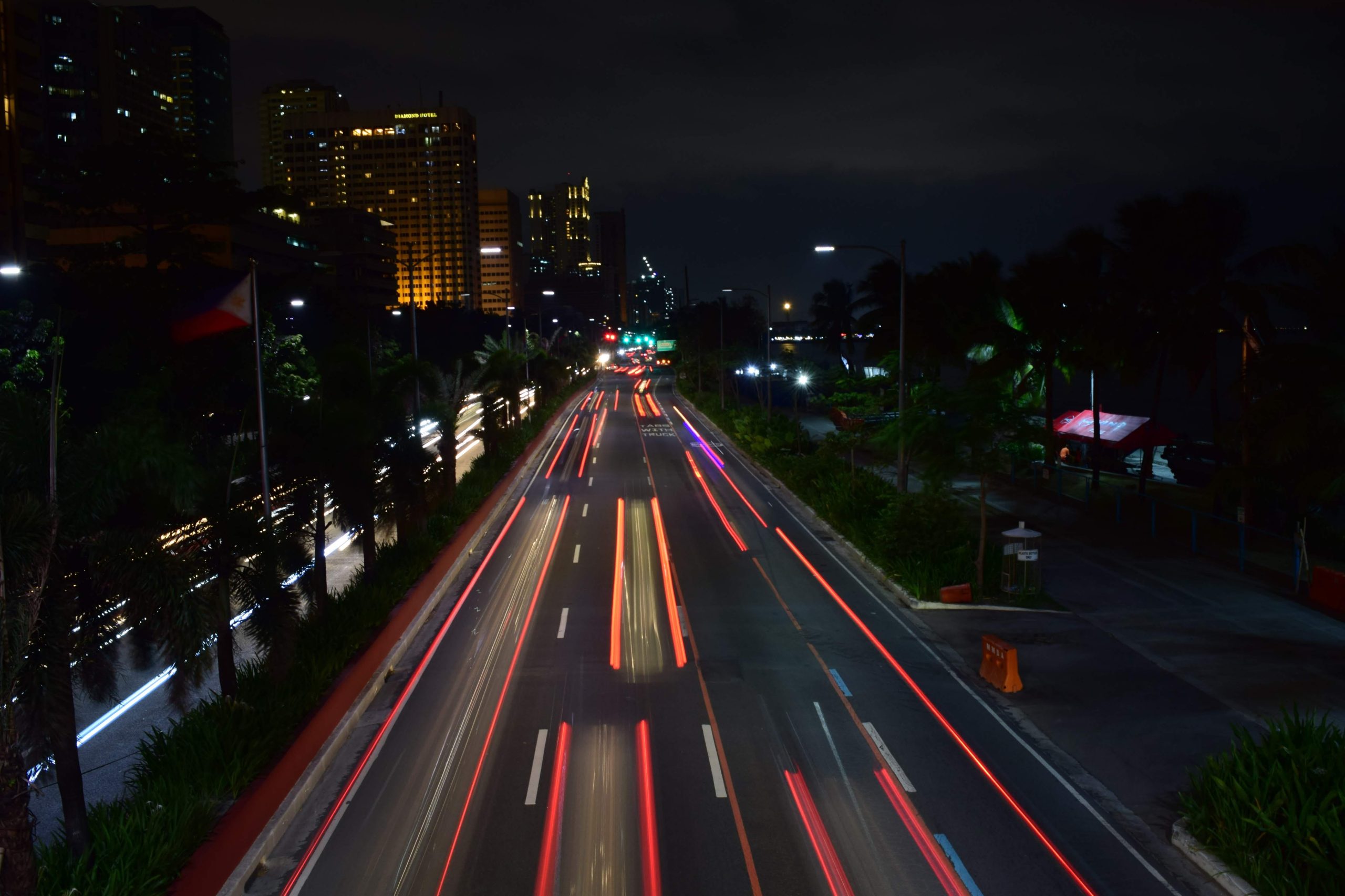 Car headlights moving quickly